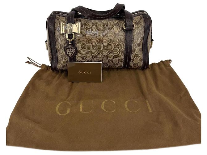 Borsa Gucci in tela e pelle marrone287