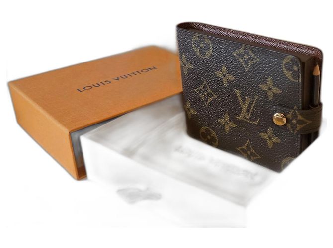 Louis Vuitton Cuaderno y lápiz. Monograma