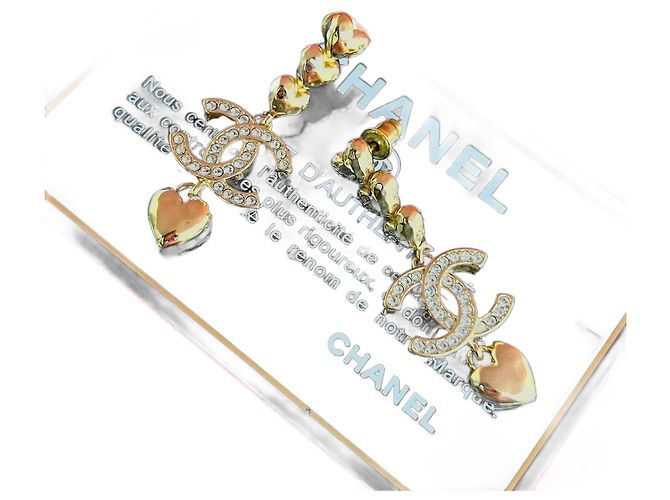 Boucles d'oreilles en forme de cœur avec le logo Coco de Chanel Doré Métallisé