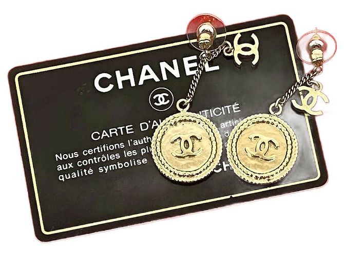 Brincos de moeda Coco Mark da Chanel Dourado Metálico