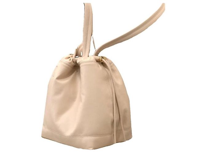 Mini borsa a secchiello Paco Rabanne in pelle beige