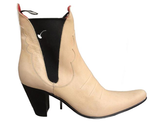 Botas Free Lance de couro creme