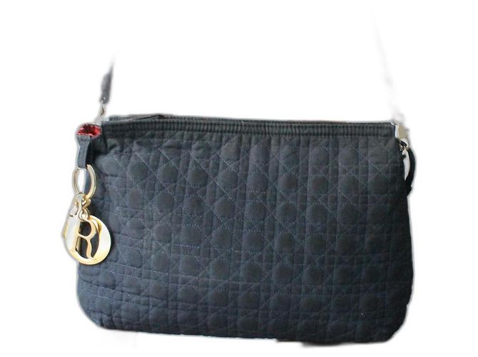Dior handbag / clutch in navy blue canage canvas pattern