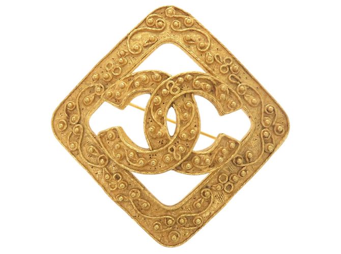 Spilla in oro Chanel Coco Mark D'oro