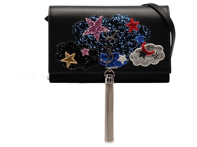 Carteira com corrente Kate em couro de bezerro preto com aplique de estrela Cloud da Saint Laurent