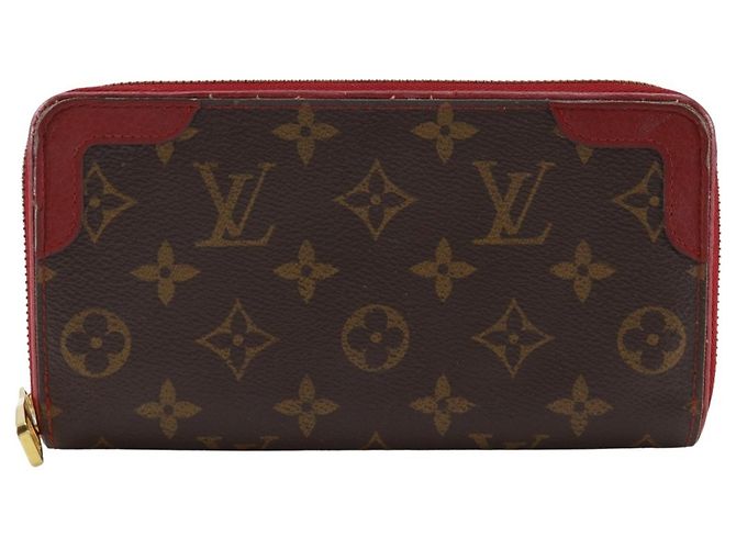 Cartera Zippy Retiro Louis Vuitton Castaño Roja Fucsia