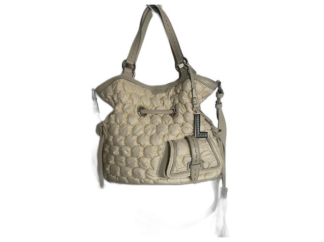 Borsa a secchiello Lancel First Flirt Crema Pelle