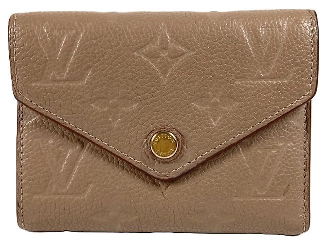 Portafoglio pieghevole Monogram Empreinte Louis Vuitton Beige