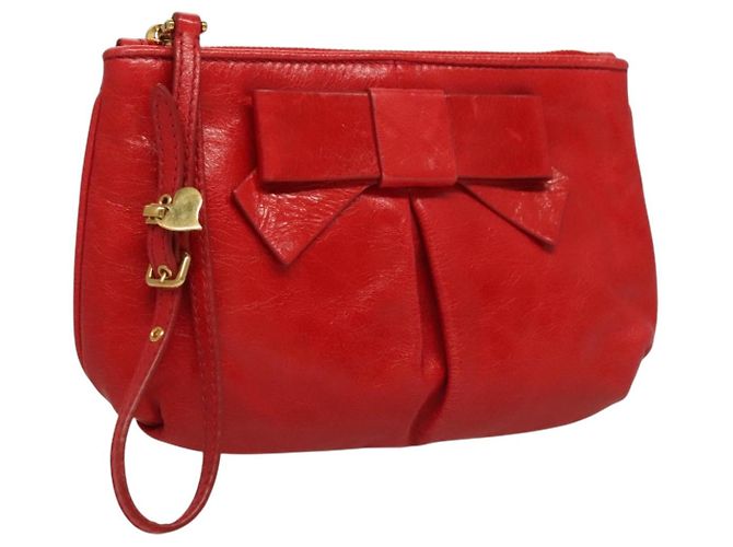 Pochette à poignet zippée en cuir Miu Miu Rouge