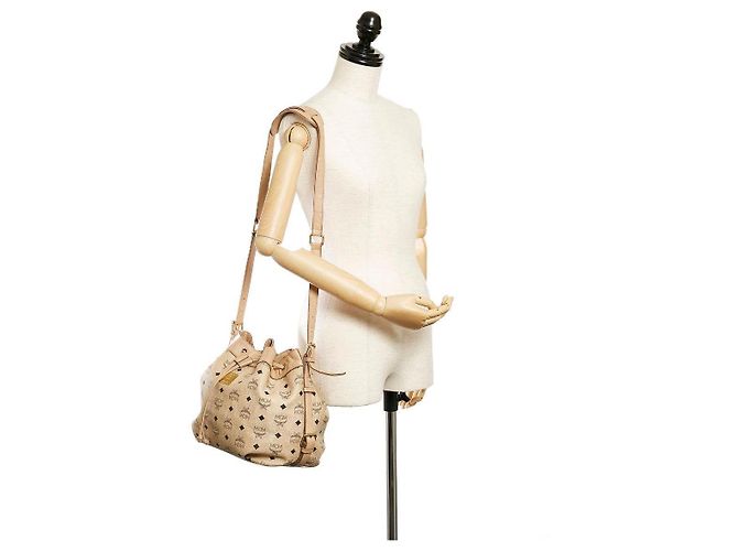 Bolsa bucket de couro Visetos MCM bege com cordão