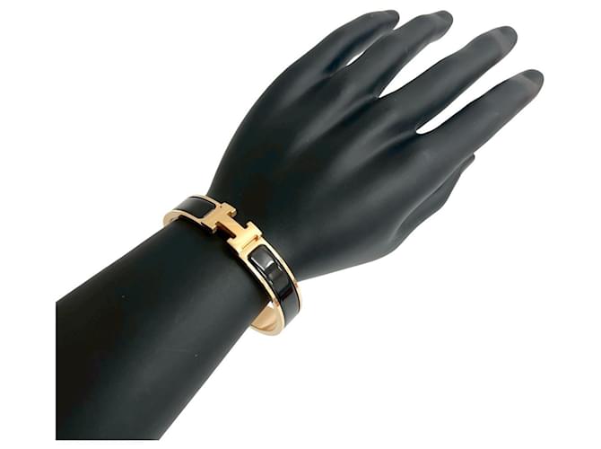 Pulseira Charm Click H da Hermès Preto Dourado 