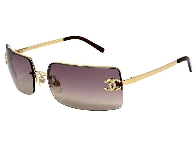 Occhiali da sole Chanel CC Logo con strass color viola e dorati D'oro Porpora