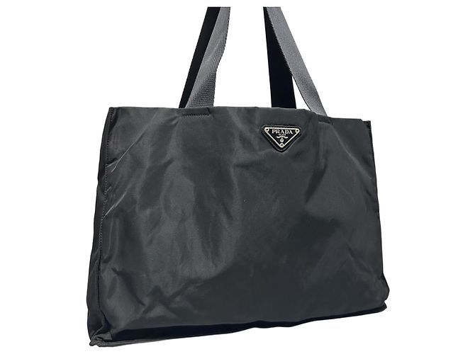 Sac à main en nylon noir avec logo Prada