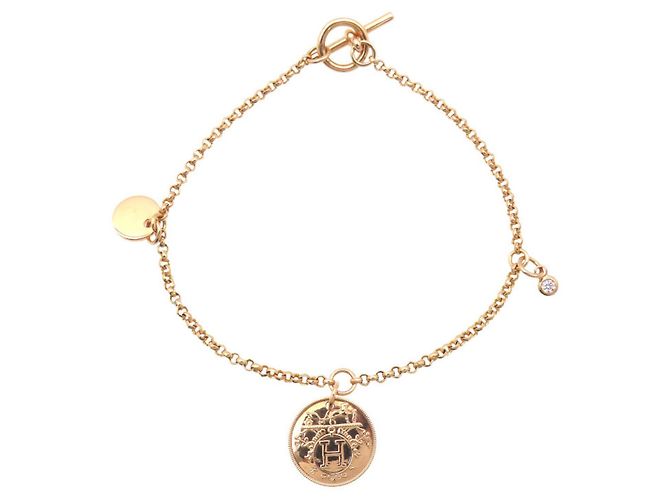 Pulseira charm Hermès Ex Libris PM em ouro rosa 18K com diamantes