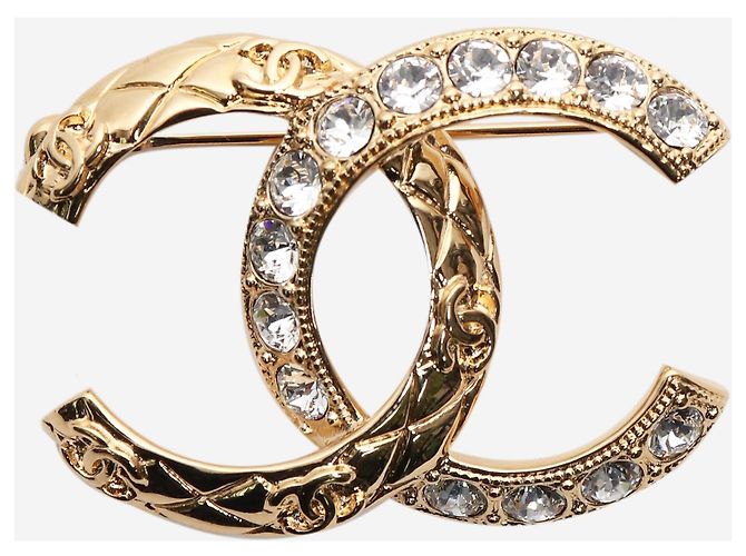 Chanel Broche de diamantes CC dorada Dorado