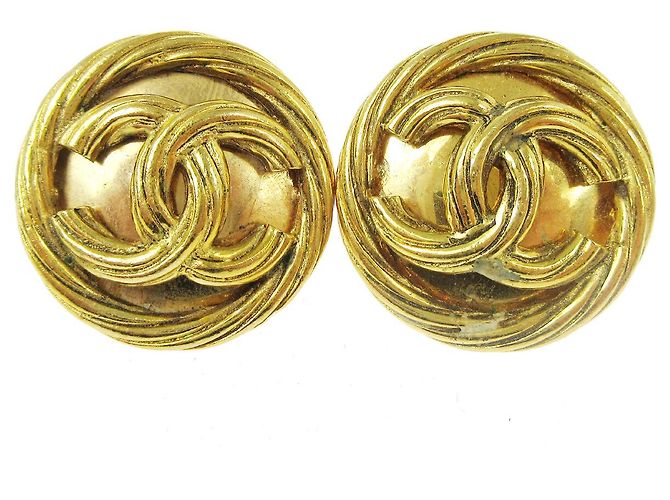 Pendientes clip Chanel CC de metal Dorado