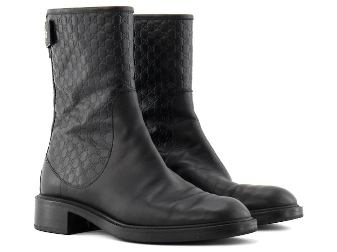 GUCCI - Black embossed monogram leather ankle boots (Size 38.5)