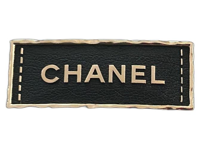 Broche rectangular Chanel negro de acero 2023