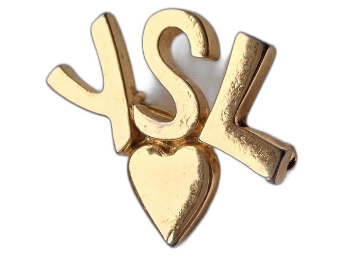 Broche Yves Saint Laurent Monogramme Cœur Dorée Bijouterie dorée 