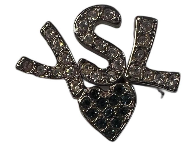Yves Saint Laurent Broche YSL em metal prateado e strass Prata