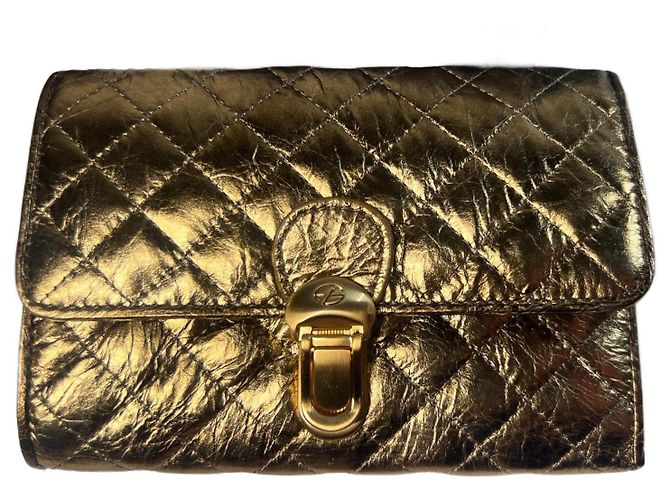 Autre Marque FRANCESCO BIASIA. Quilted gold wallet Golden