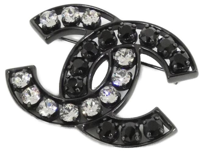 Schwarze Metall-Kristallbrosche von Chanel