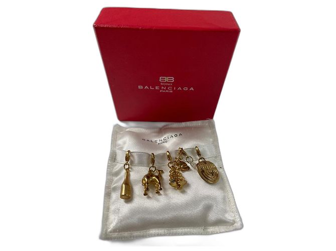 Set di 4 charm Balenciaga D'oro