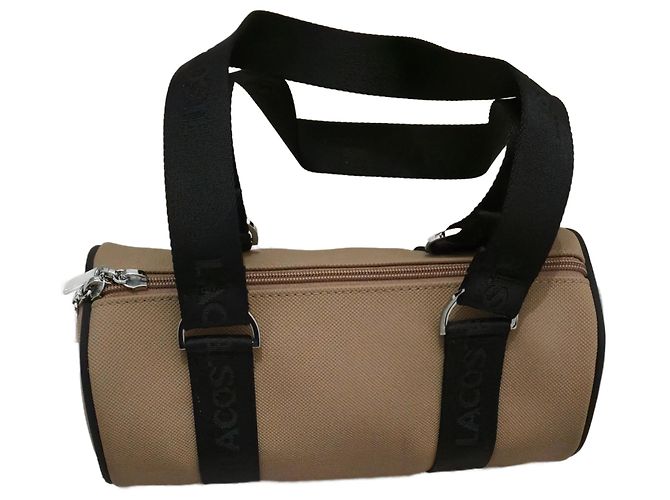 Borsa LACOSTE PELOCHON e il suo portafoglio Marrone chiaro