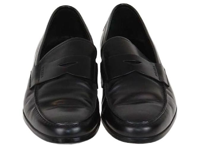 Mocassins en cuir verni noir Prada 