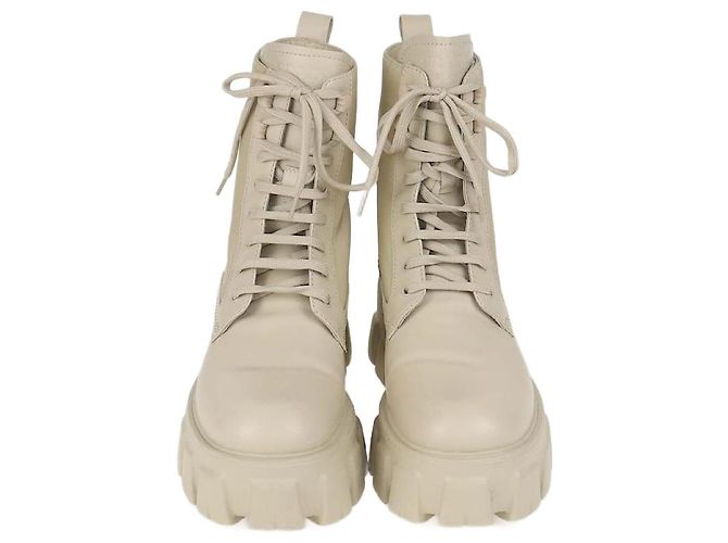 Botas de combate Monolith em couro e nylon bege da Prada