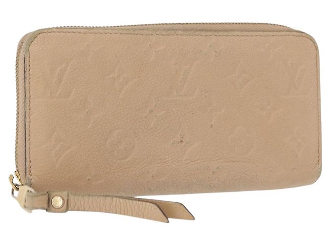 Cartera Zippy Monogram Empreinte LOUIS VUITTON Beige M61866 Auth bs31261