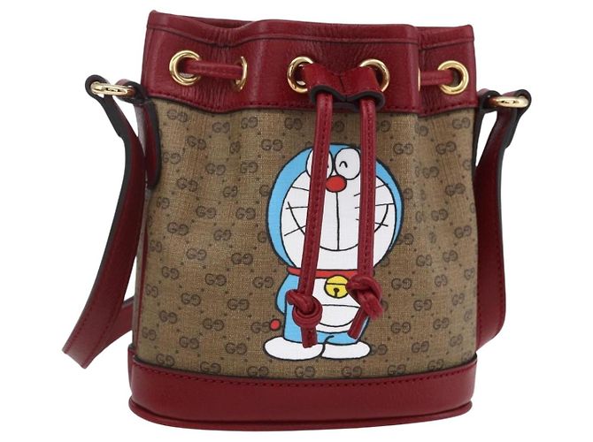 Gucci Mini borsa a secchiello Doraemon Micro GG Supreme in PVC beige 647801 Auth 154926SAM D'oro