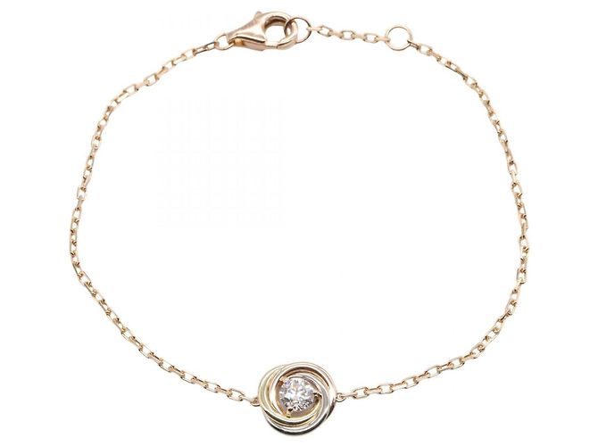 Bracciale Charm Trinity di Cartier D'oro