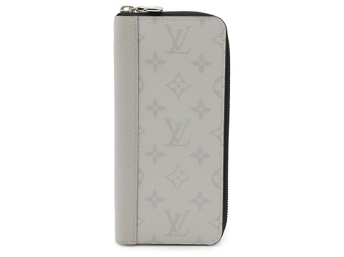 Cartera Zippy Vertical Monogram Taiga Louis Vuitton Blanco