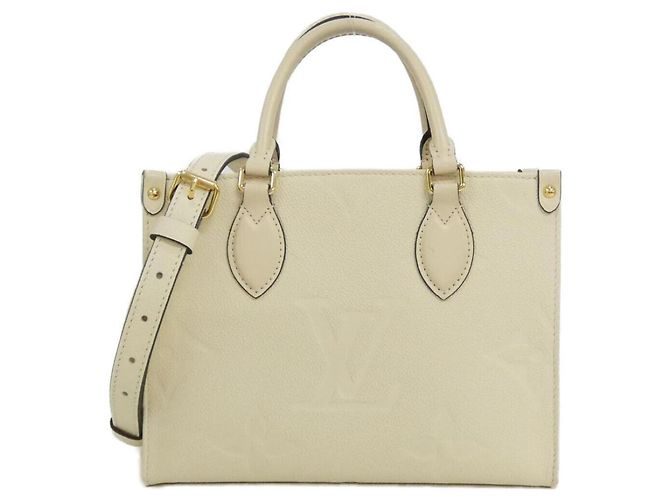 Sac à main On-the-Go PM en Monogram Empreinte Louis Vuitton Monogramme