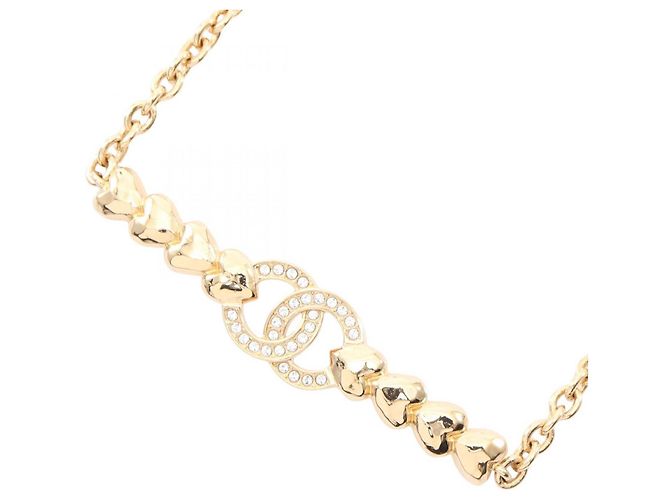 Collier en forme de cœur avec le logo Coco de Chanel Doré