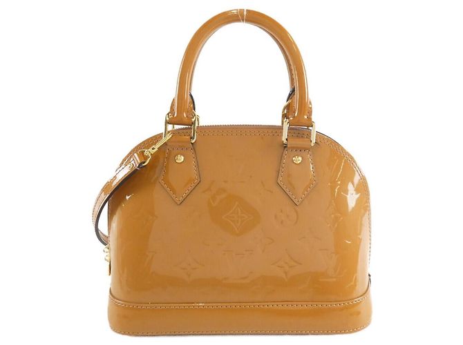 Bolsa Alma BB Verniz Louis Vuitton Dourado