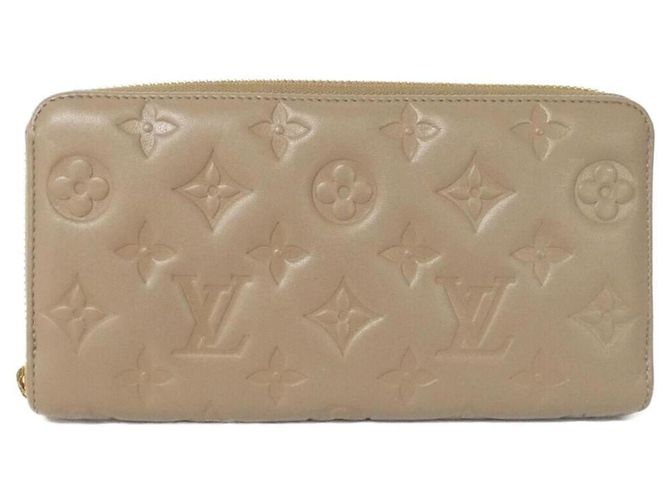 Cartera Zippy Coussin Louis Vuitton Gris pardo