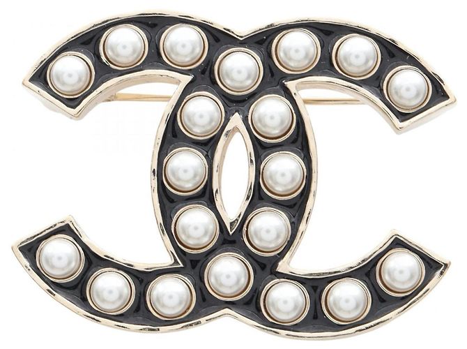 Spilla Coco Mark di Chanel Nero Bianco D'oro