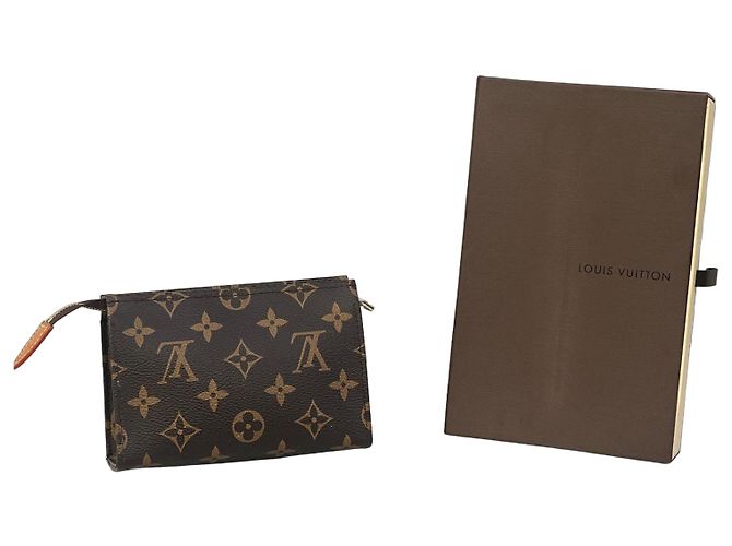 Pochette Louis Vuitton Marrone in Pelle