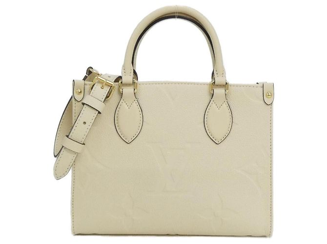 Bolsa On-the-Go PM em Monogram Empreinte Louis Vuitton Bege