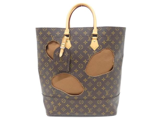 Bolsa Louis Vuitton Monogram com furos Marrom
