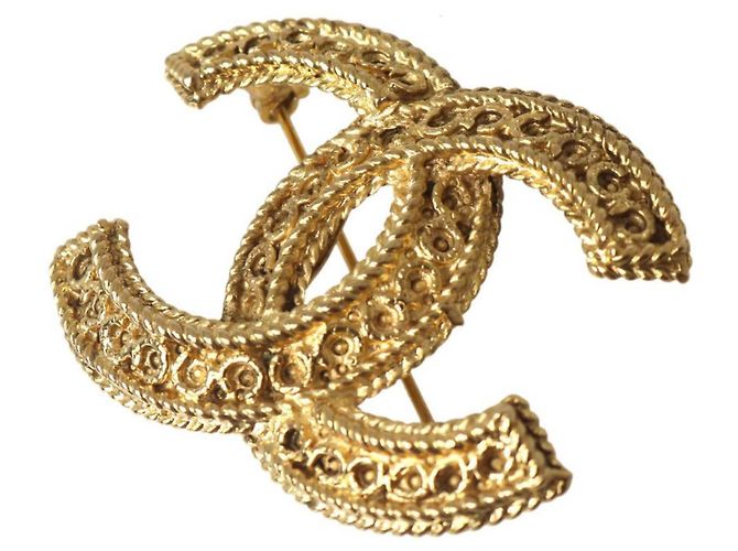Spilla Chanel Coco Mark 1108 in oro D'oro