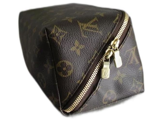 Pochete de sapatos em lona monogram da Louis Vuitton Marrom