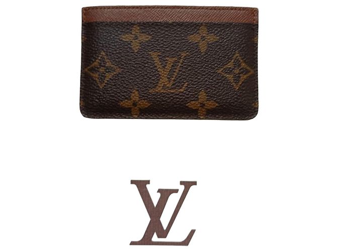 Louis Vuitton Porte Carte is a brown