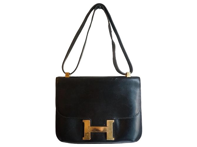 Bolsa Hermès Constance em couro box preto