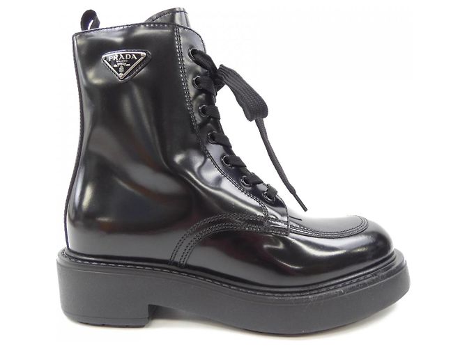 Bottes en cuir brossé Prada Noir