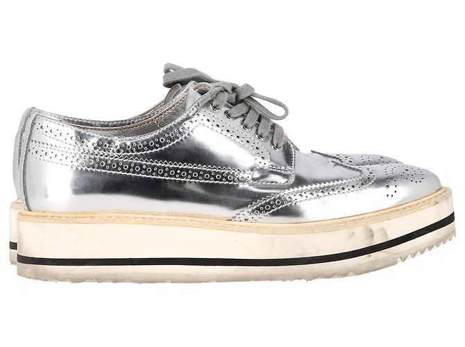 Prada Wingtip Oxford Platform Sneakers in Metallic Silver Leather Silvery