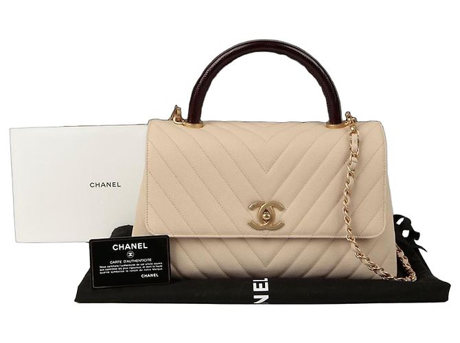 Coco Handle Chanel Bolsa de ombro média em couro caviar com alça de coco Branco