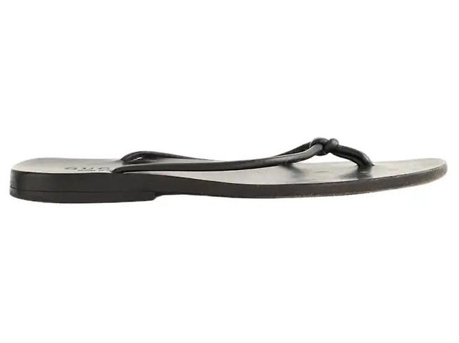 Gucci Black leather flip-flops